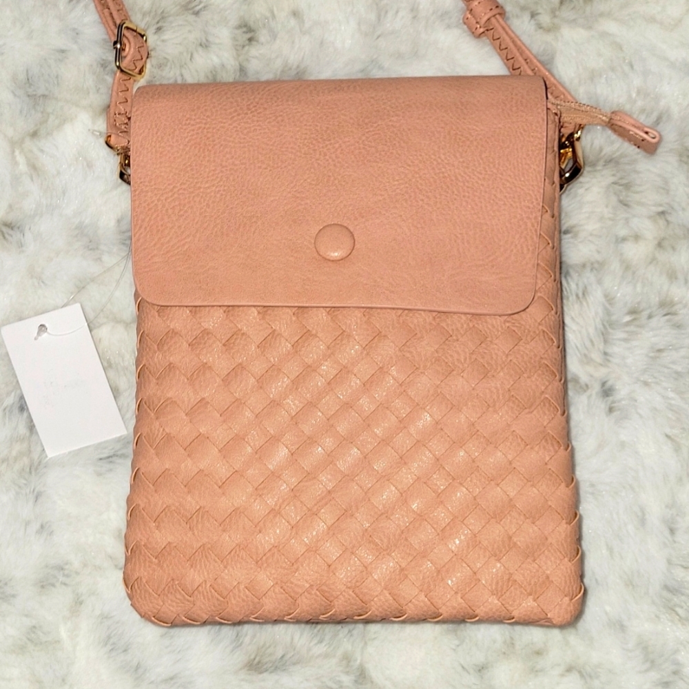 Rose color weave crossbody purse. Very soft.